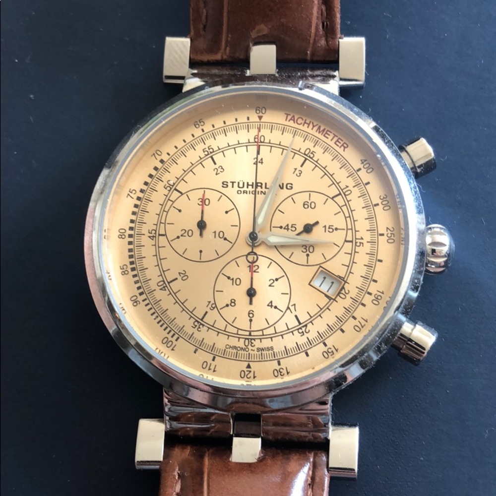 Men’s Stuhrling genuine leather band watch.